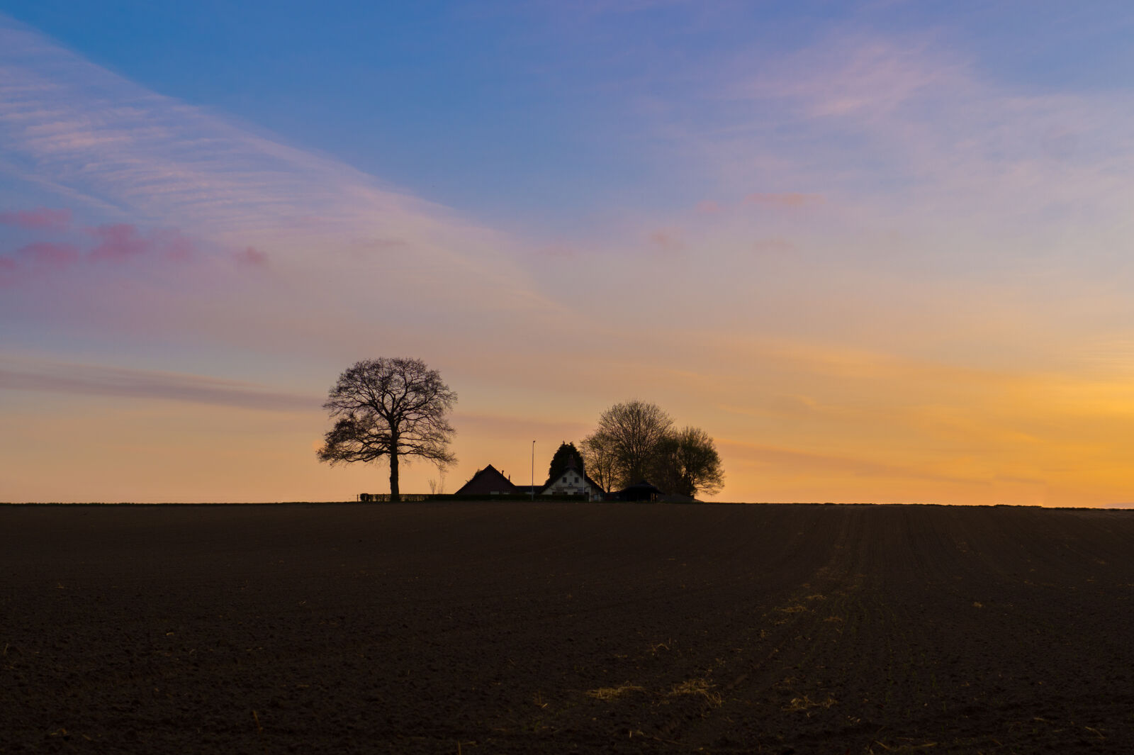 Sony DT 35mm F1.8 SAM sample photo. Blue, clouds, farm, farmland photography