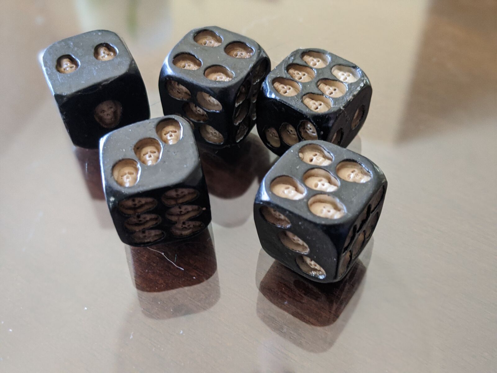 Google Pixel 3 sample photo. Skull dice, skulls, dice photography