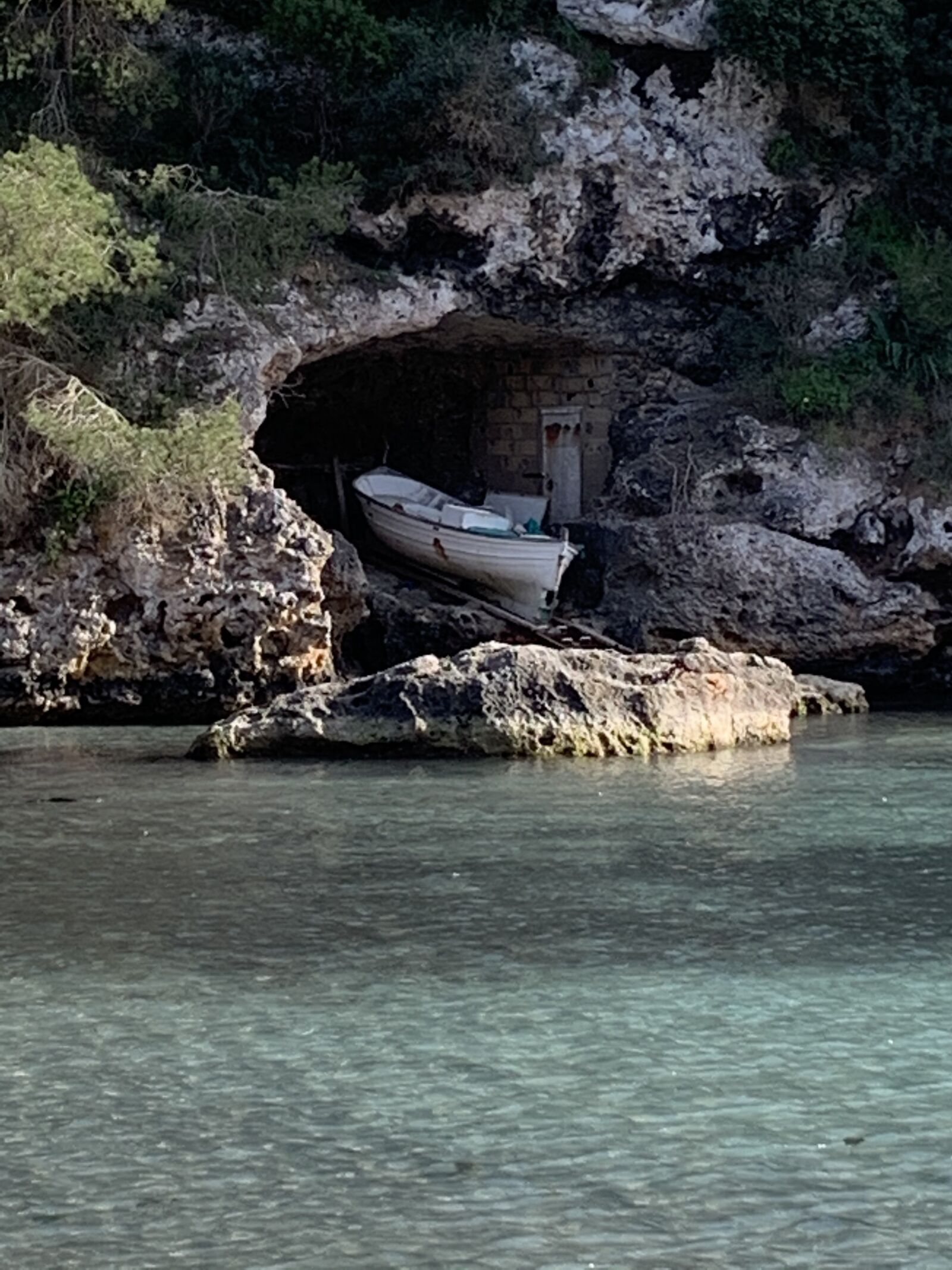 Apple iPhone XR sample photo. Fishing boat, rock, mallorca photography