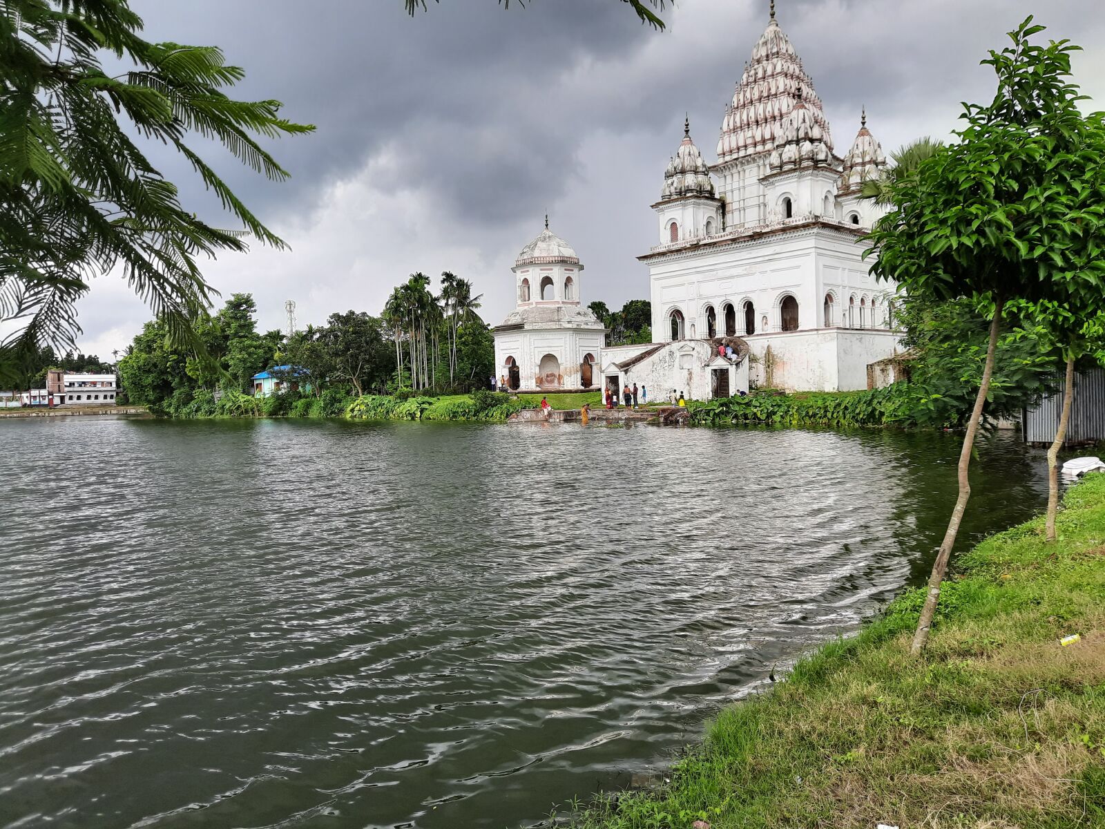 Samsung SM-M215F sample photo. Temple, water, tree photography