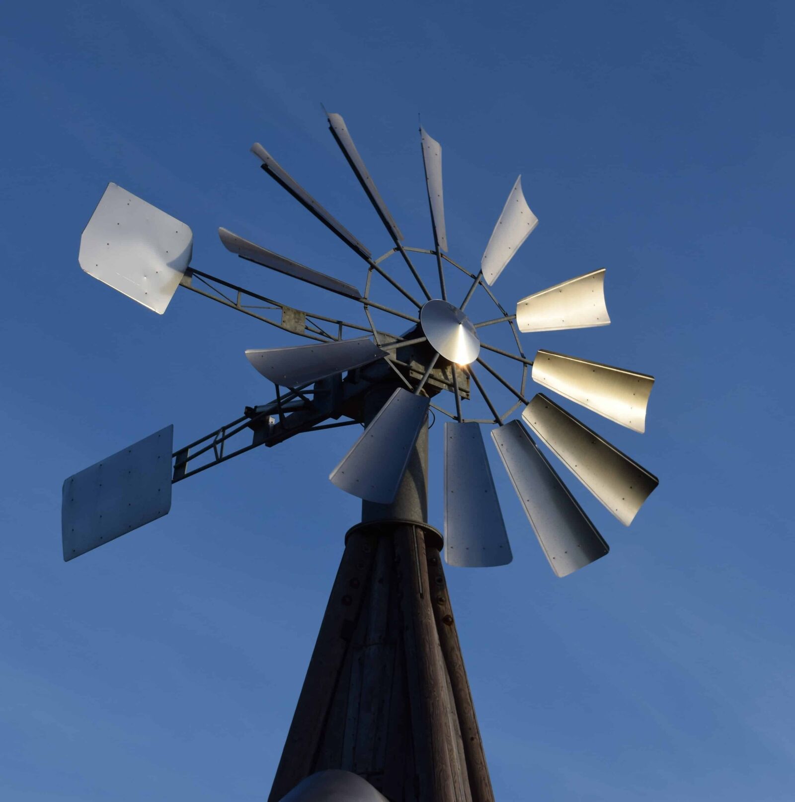 Nikon D3300 sample photo. Blue sky, wheel, machine photography