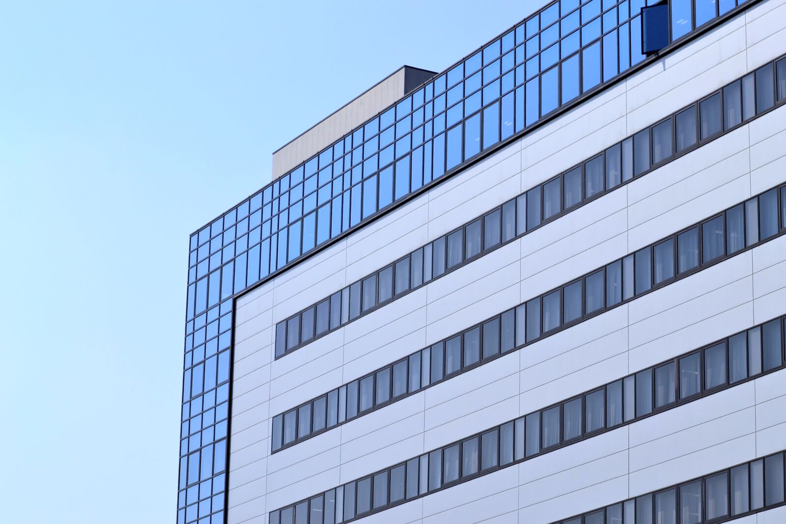 Nikon D3100 sample photo. Glass products, building, modern photography