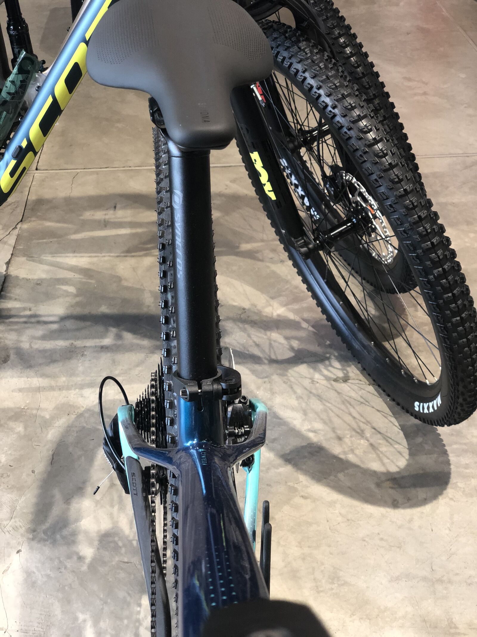 iPhone X back dual camera 6mm f/2.4 sample photo. Bicycle, store, mtb photography