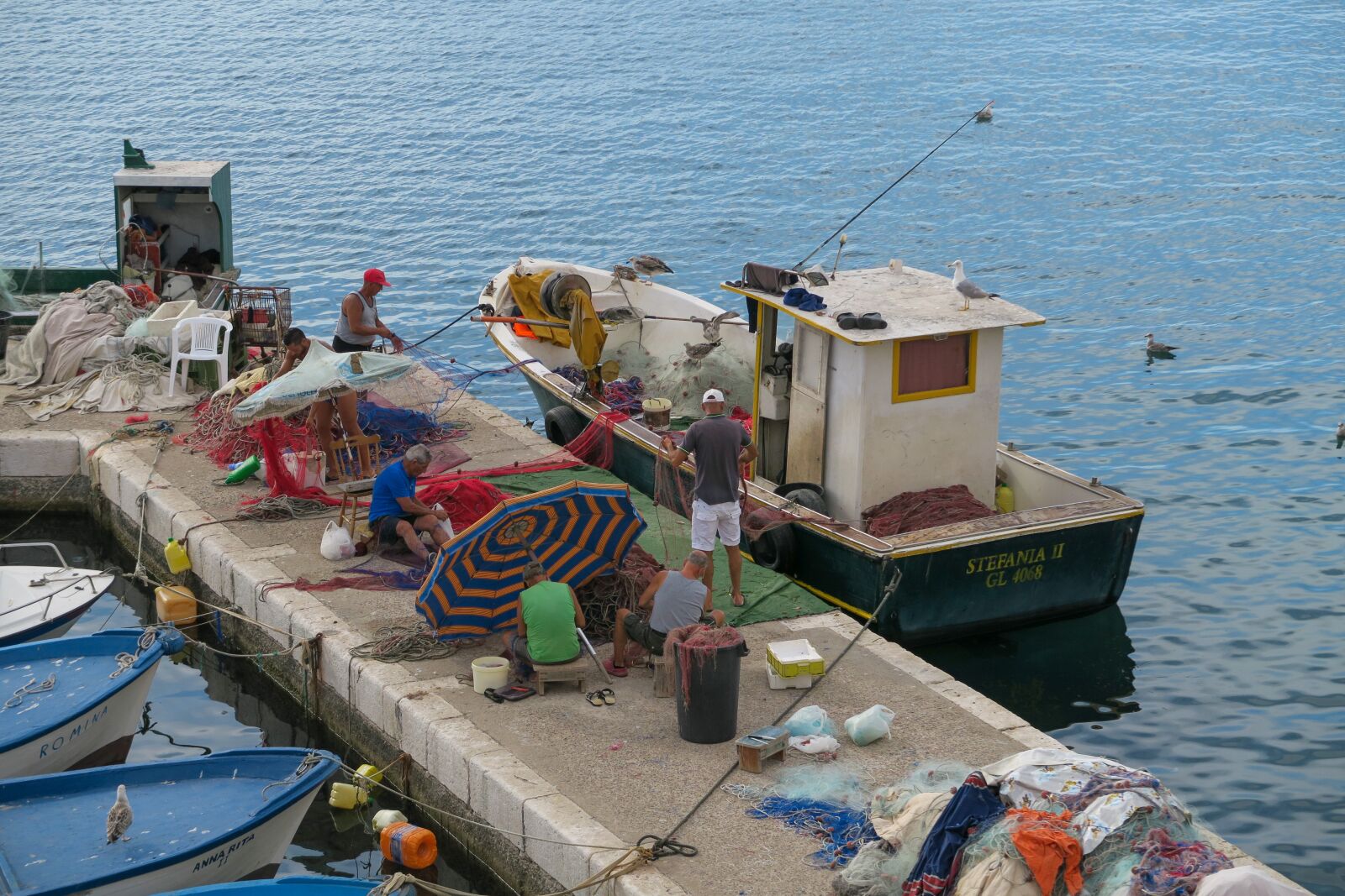 Canon PowerShot G7 X sample photo. Gallipoli, sea, fishermen photography