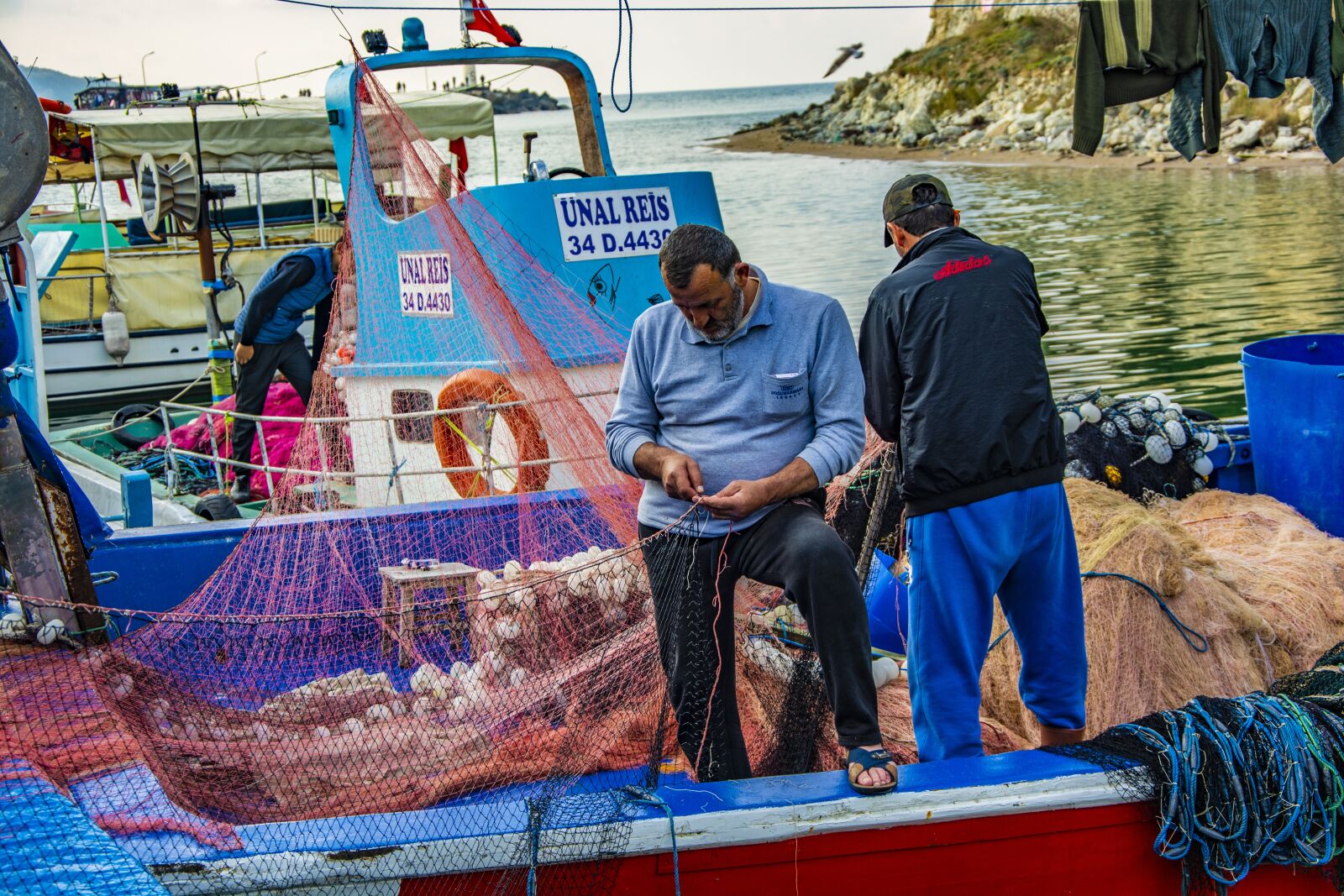 Nikon D5200 sample photo. Fisherman, boat, water photography