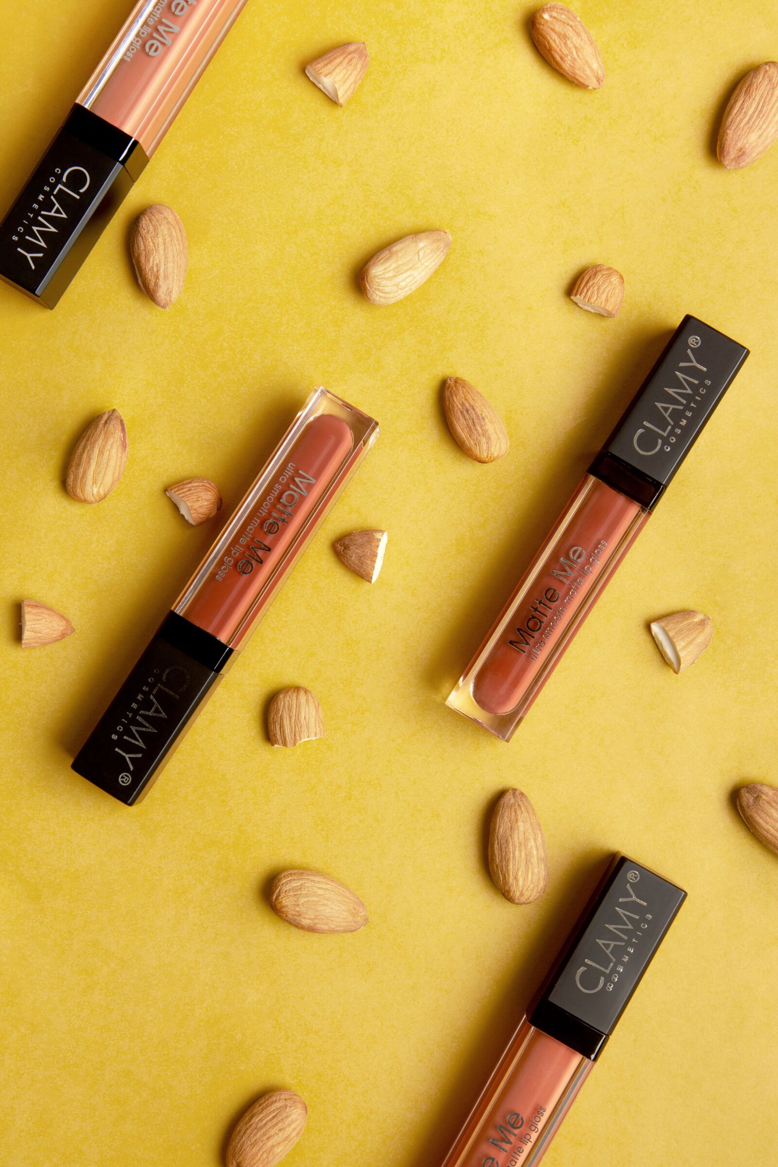 Canon EF 24-105mm F4L IS USM sample photo. Clamy cosmetics matte lipgloss photography
