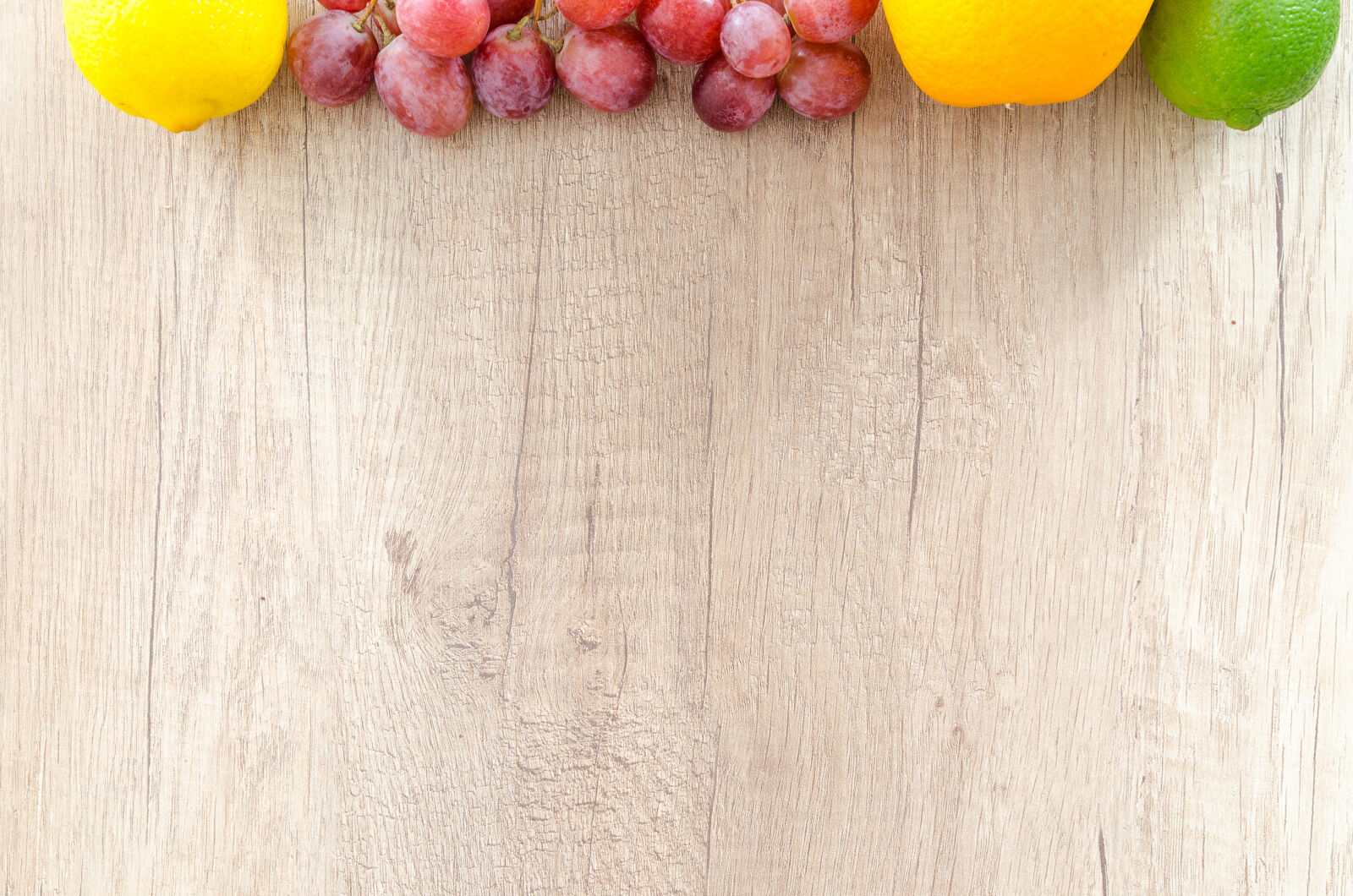 Nikon D5100 sample photo. Above, apple, background, berry photography