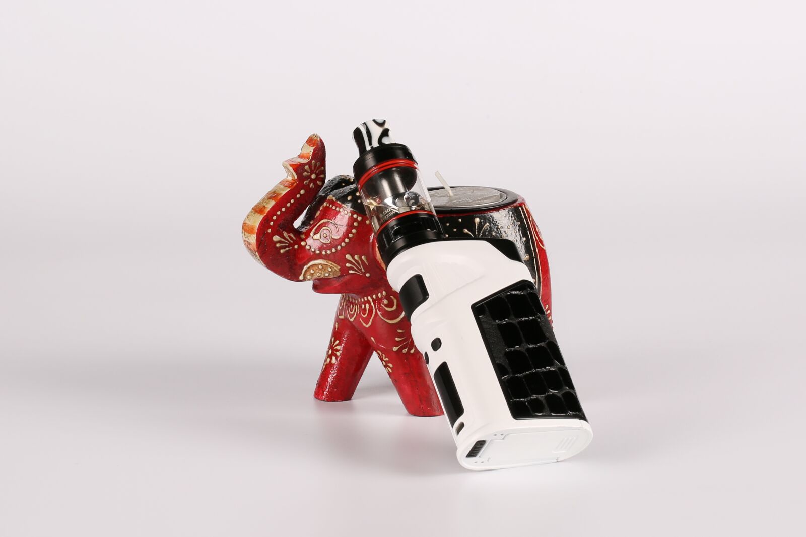 Canon EF 100mm F2.8L Macro IS USM sample photo. Electronic cigarette, elephants, doll photography