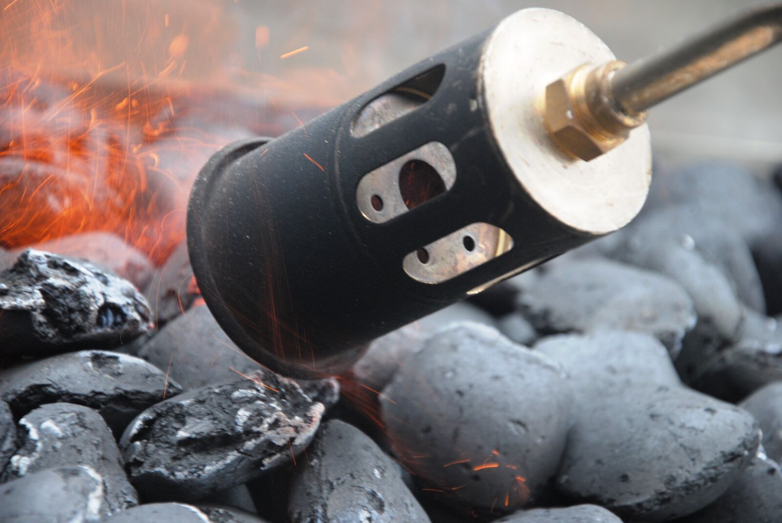 Nikon D3000 sample photo. Carbon, fire, embers photography