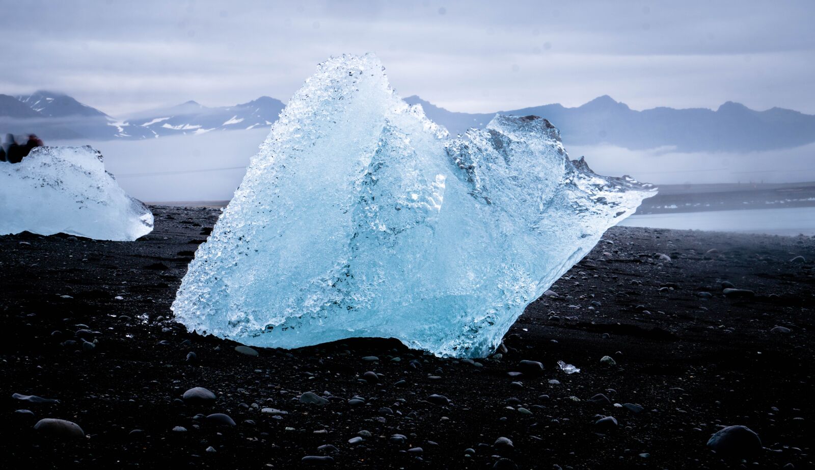 Sony E 55-210mm F4.5-6.3 OSS sample photo. Iceberg, beach, iceland photography