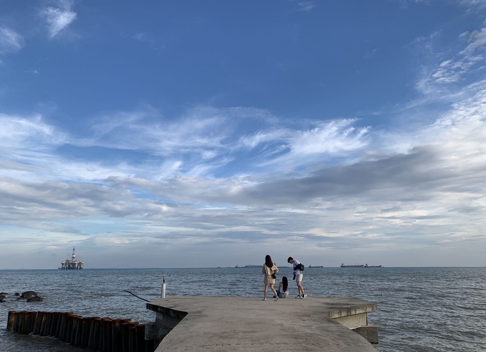 iPhone XS back dual camera 4.25mm f/1.8 sample photo. Youth, sea, skies photography