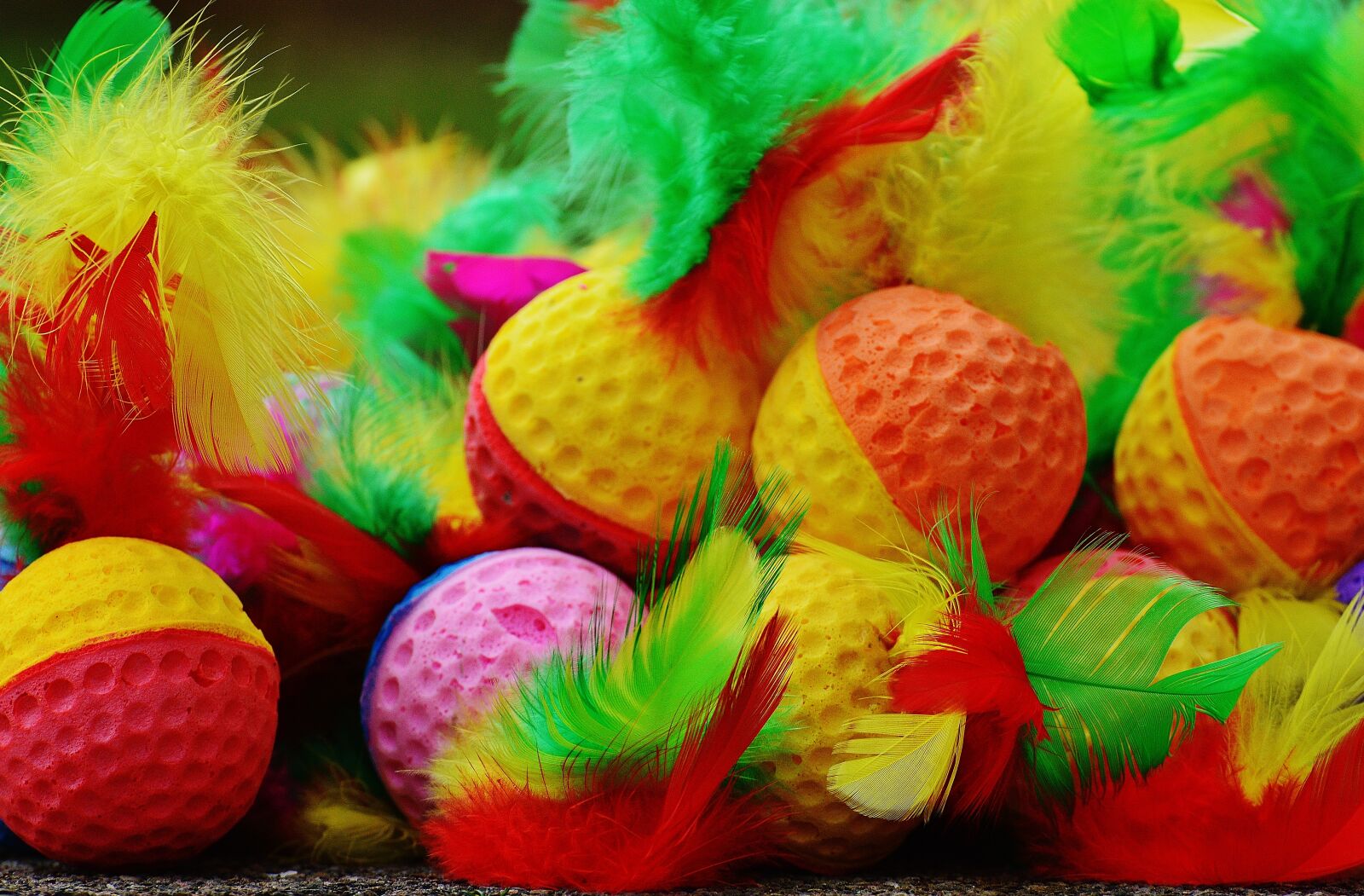 Nikon D3200 sample photo. Foam balls, feather, colorful photography