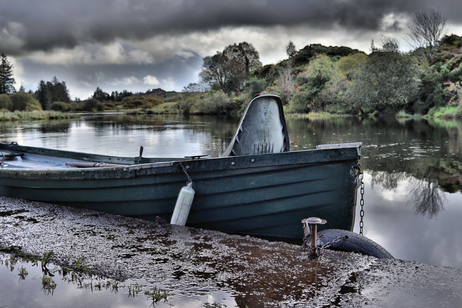 Canon EF-S 24mm F2.8 STM sample photo. Boat, river, rainy day photography