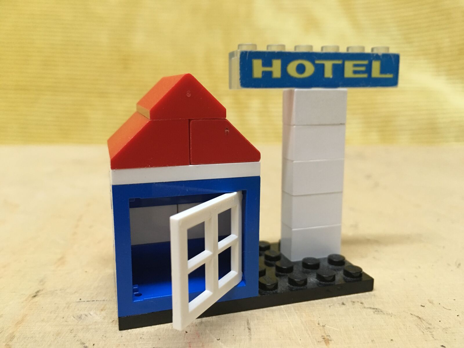 iPhone SE back camera 4.15mm f/2.2 sample photo. Lego, hotel, house photography