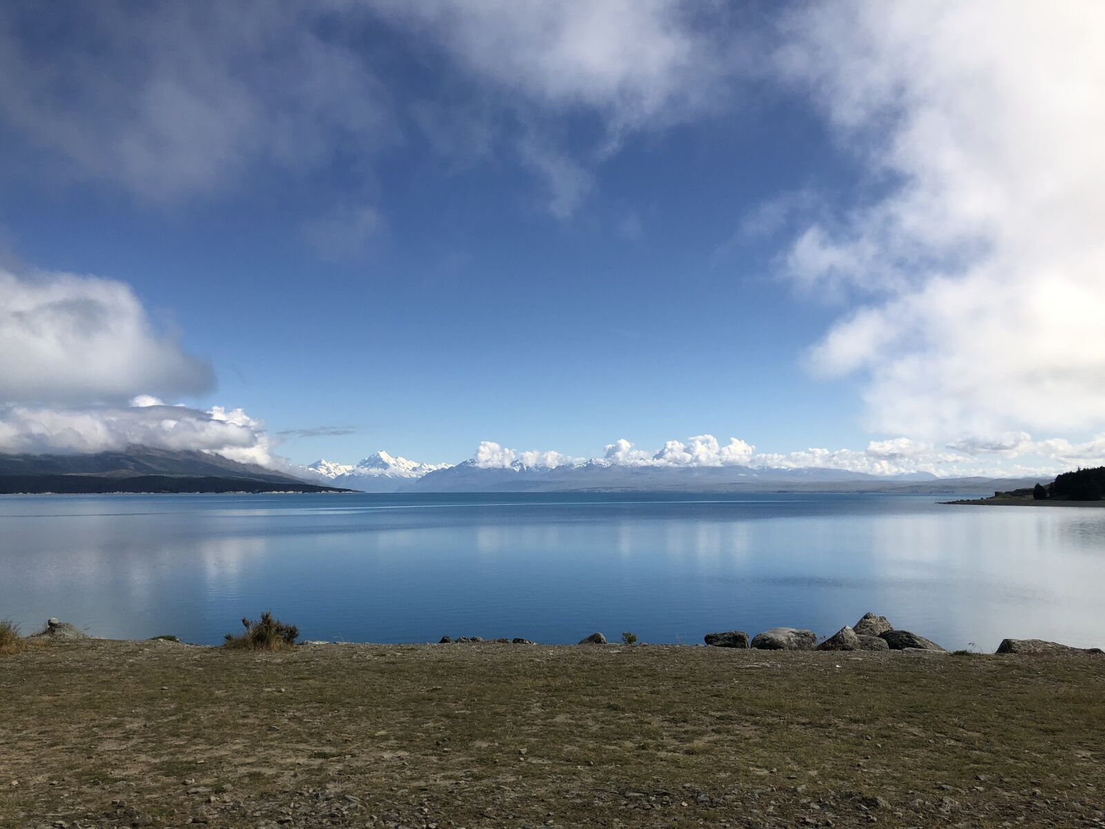 iPhone 8 back camera 3.99mm f/1.8 sample photo. Blue, lake, clouds photography