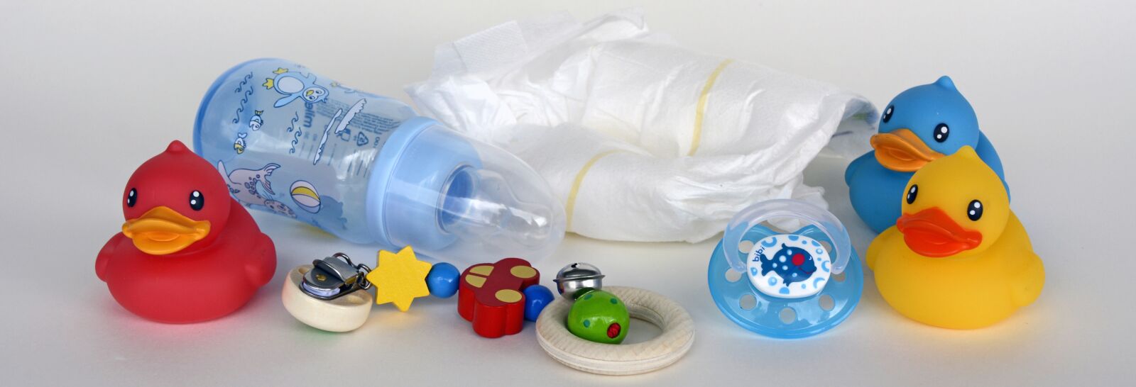 Nikon D7100 sample photo. Ducks, toys, baby bottle photography