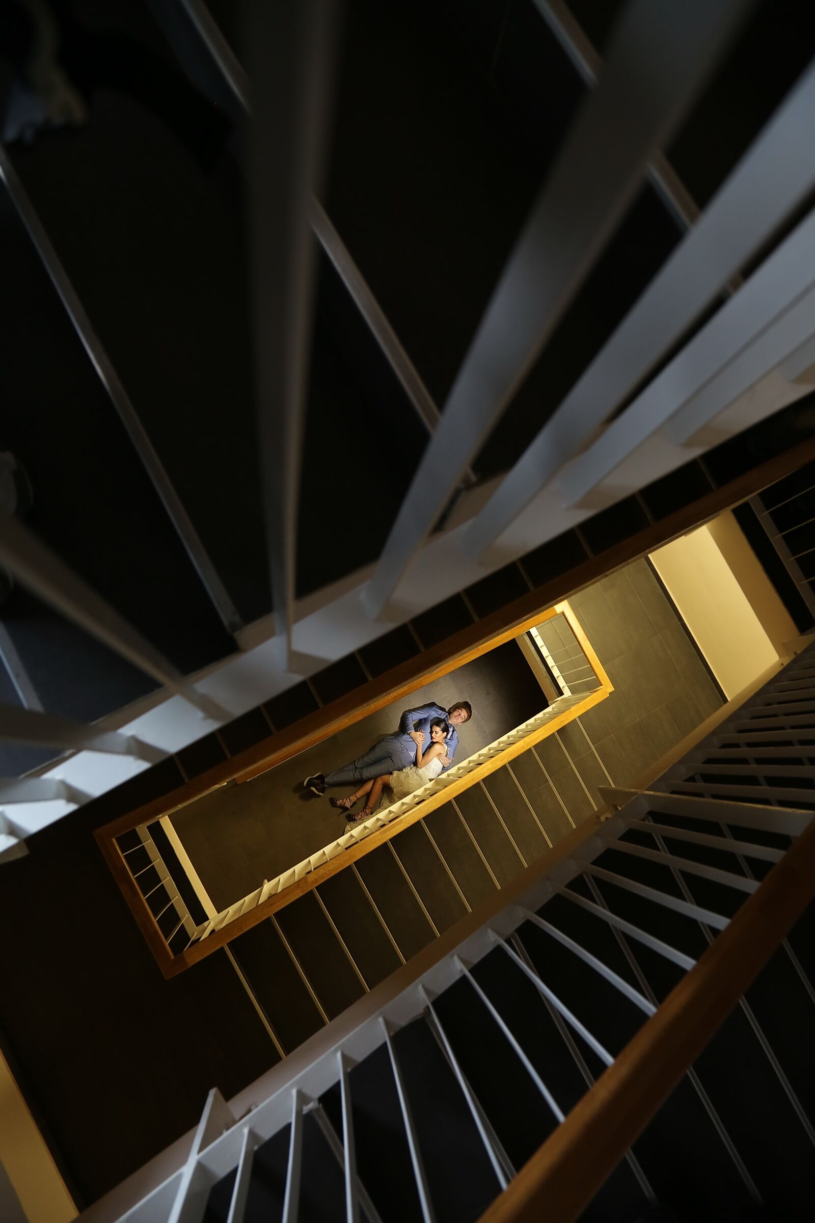 Canon EF 24-105mm F4L IS USM sample photo. Embrace, distance, wife, laying photography