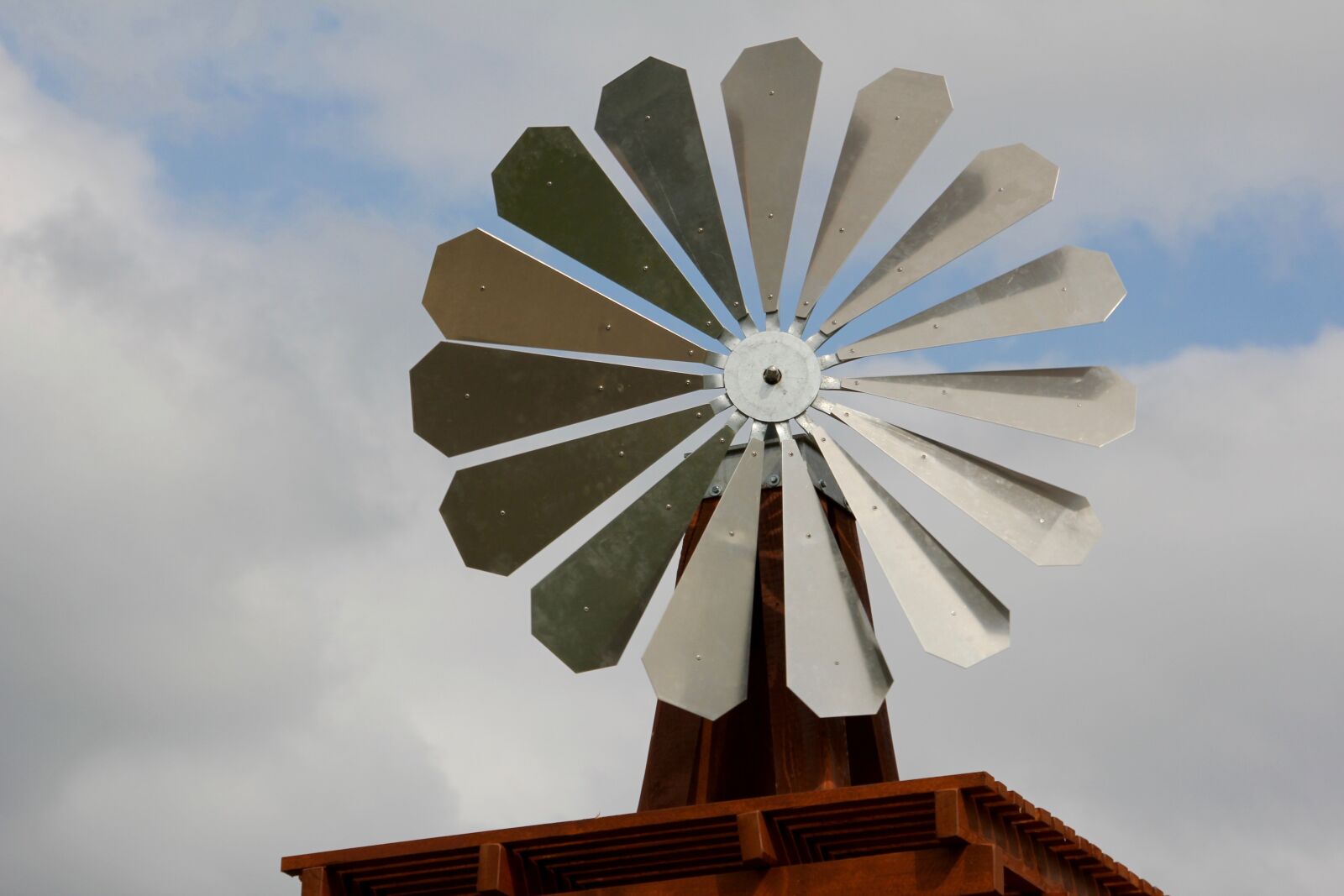 Canon EOS 60D sample photo. Pinwheel, metal, wind photography