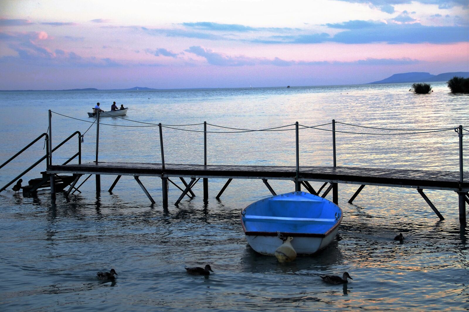 Sony SLT-A58 sample photo. Rowboat, lake, evening photography