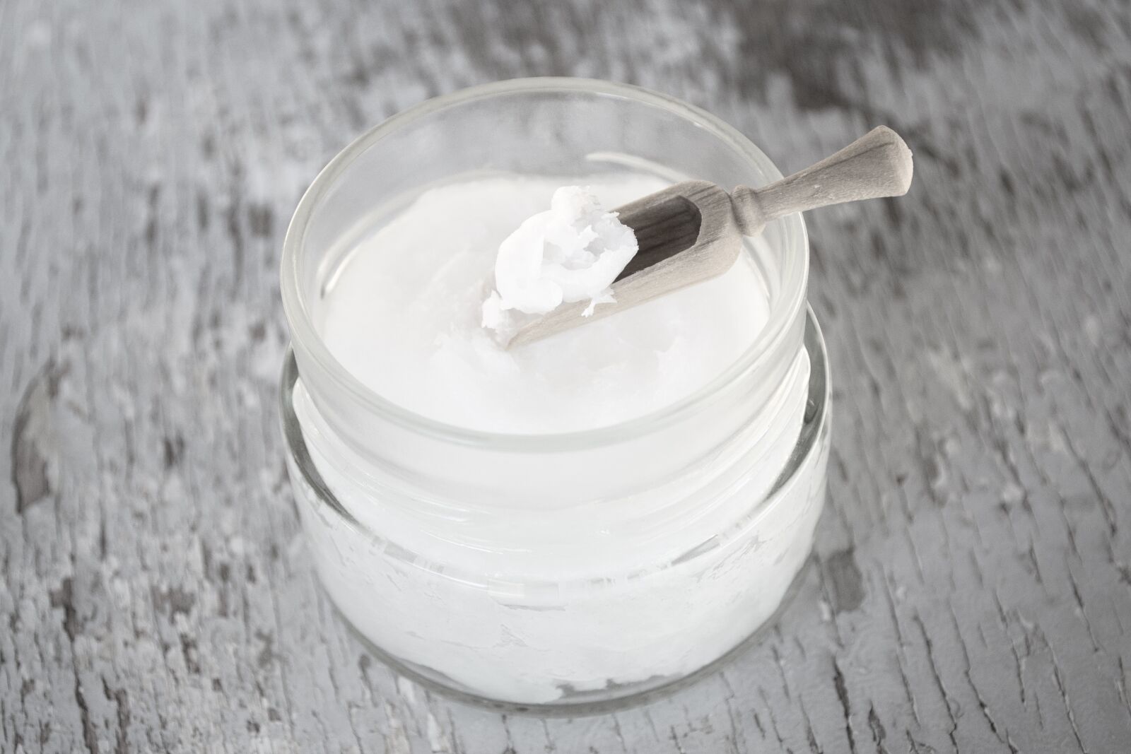 Nikon D3100 sample photo. Coconut oil on wooden photography