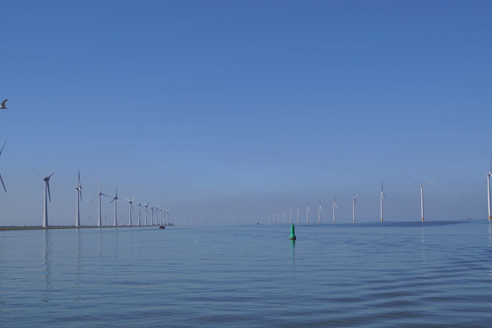 Sony SLT-A68 + Sony DT 18-55mm F3.5-5.6 SAM II sample photo. Windmills, ijsselmeer, water photography