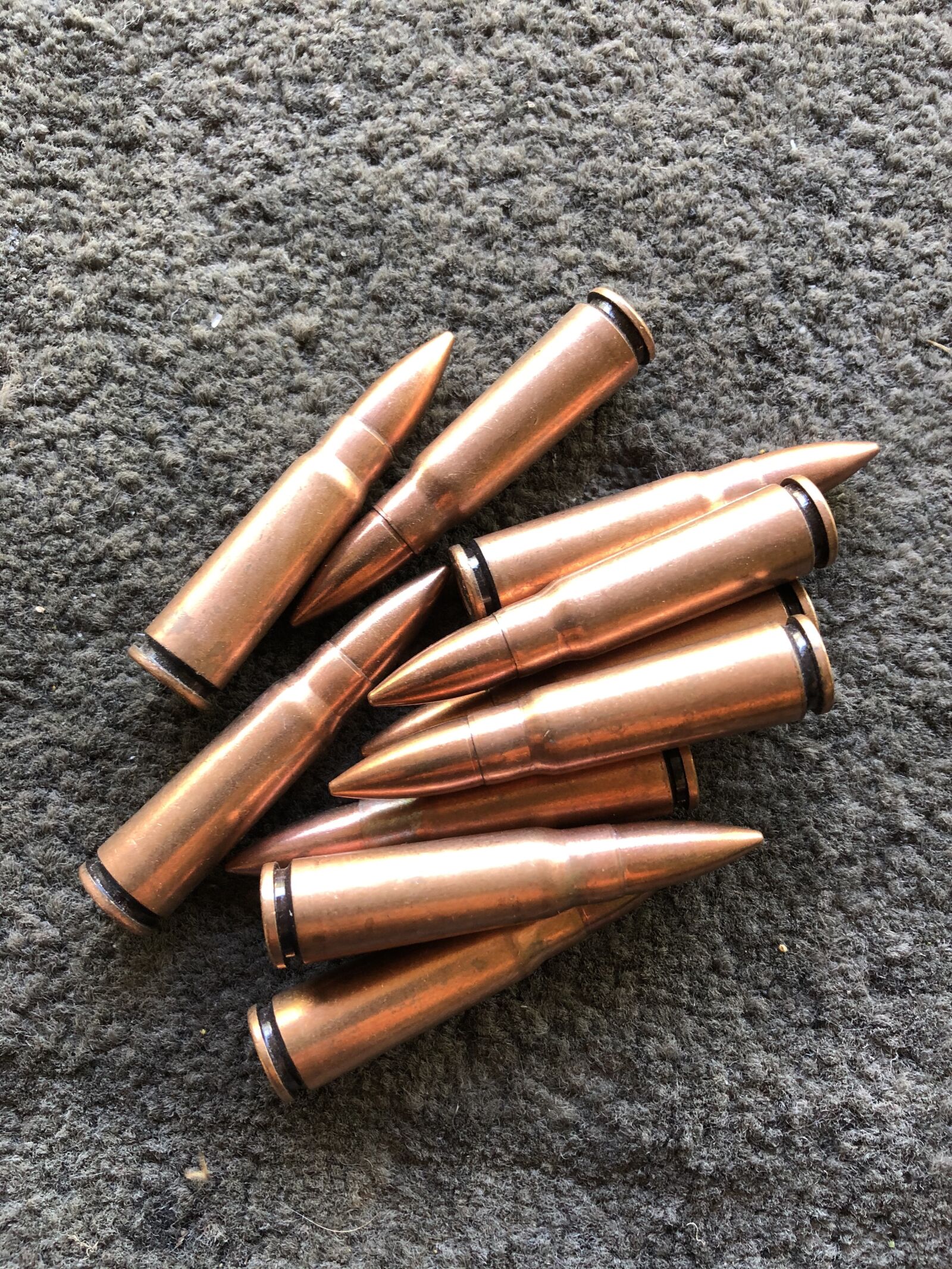 Apple iPhone X sample photo. Bullets, rifle, shooting photography