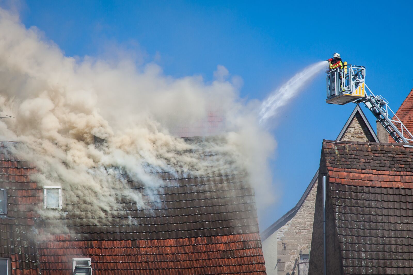 Canon EOS 50D + Canon EF 24-105mm F4L IS USM sample photo. Smoke, fire, brand photography