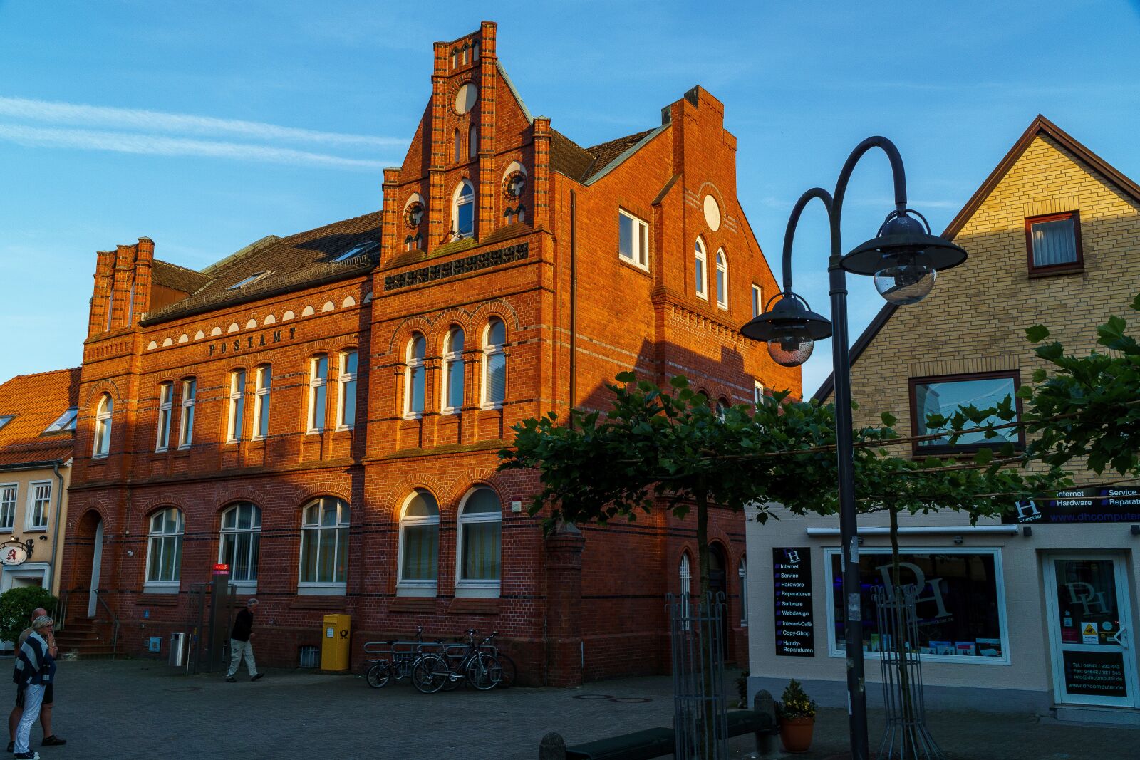 Sony a6000 + Sony E PZ 18-105mm F4 G OSS sample photo. Kappeln, town hall, baltic photography