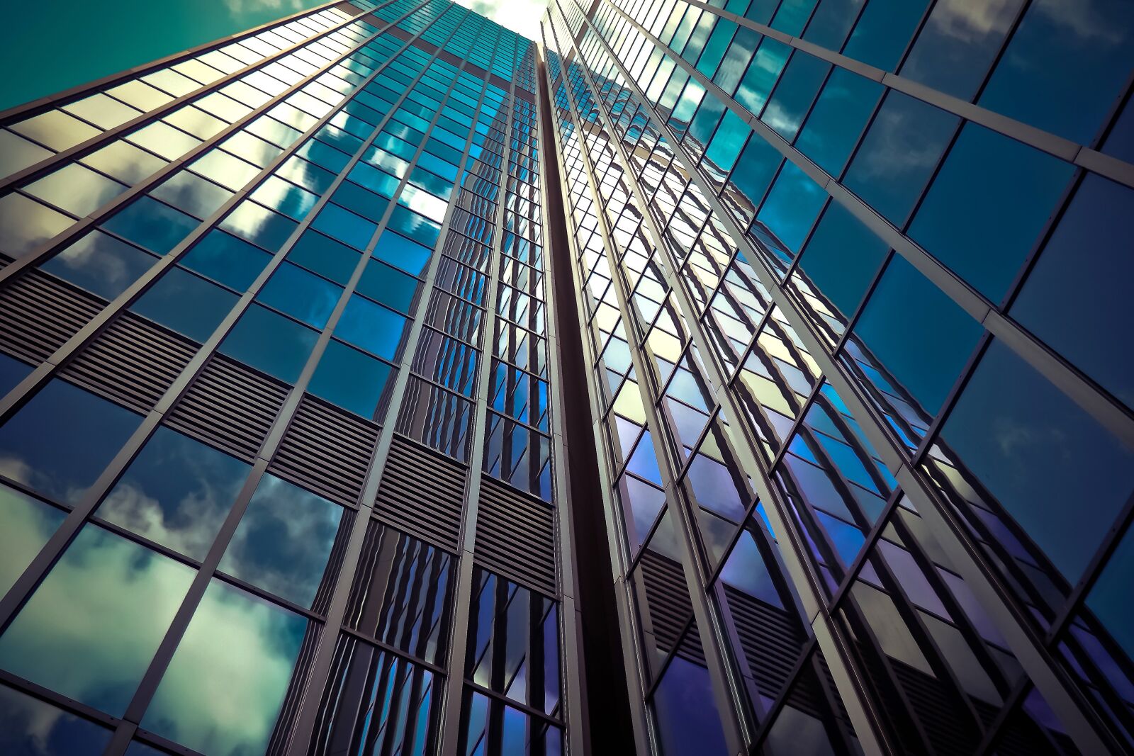 Olympus OM-D E-M10 sample photo. Architecture, skyscraper, glass facades photography