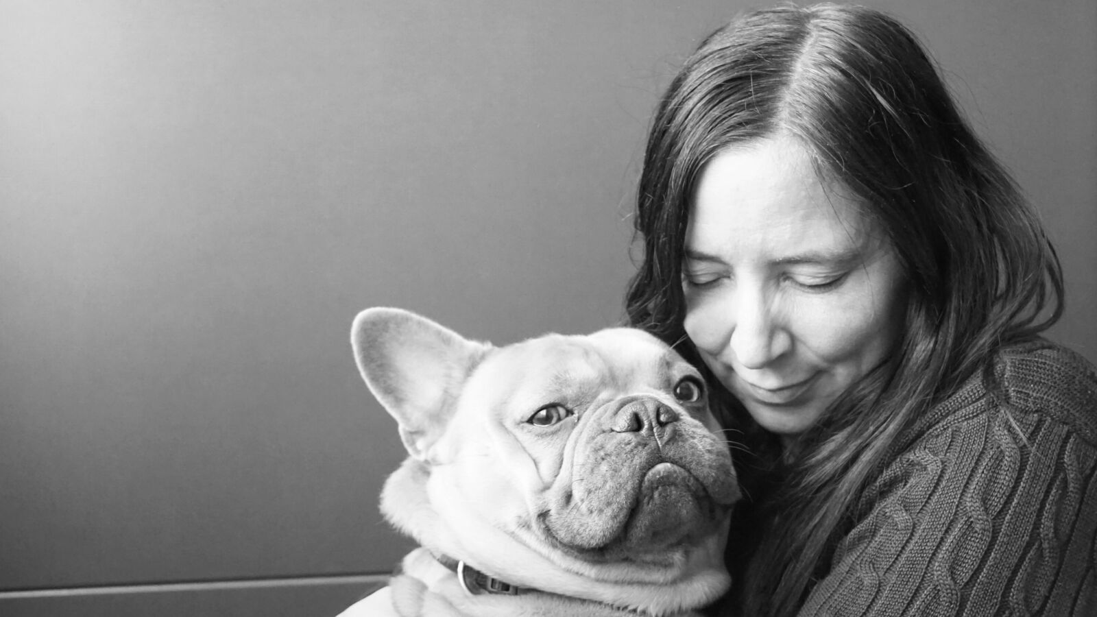 Sony E 18-200mm F3.5-6.3 OSS LE sample photo. French bulldog, dog, woman photography
