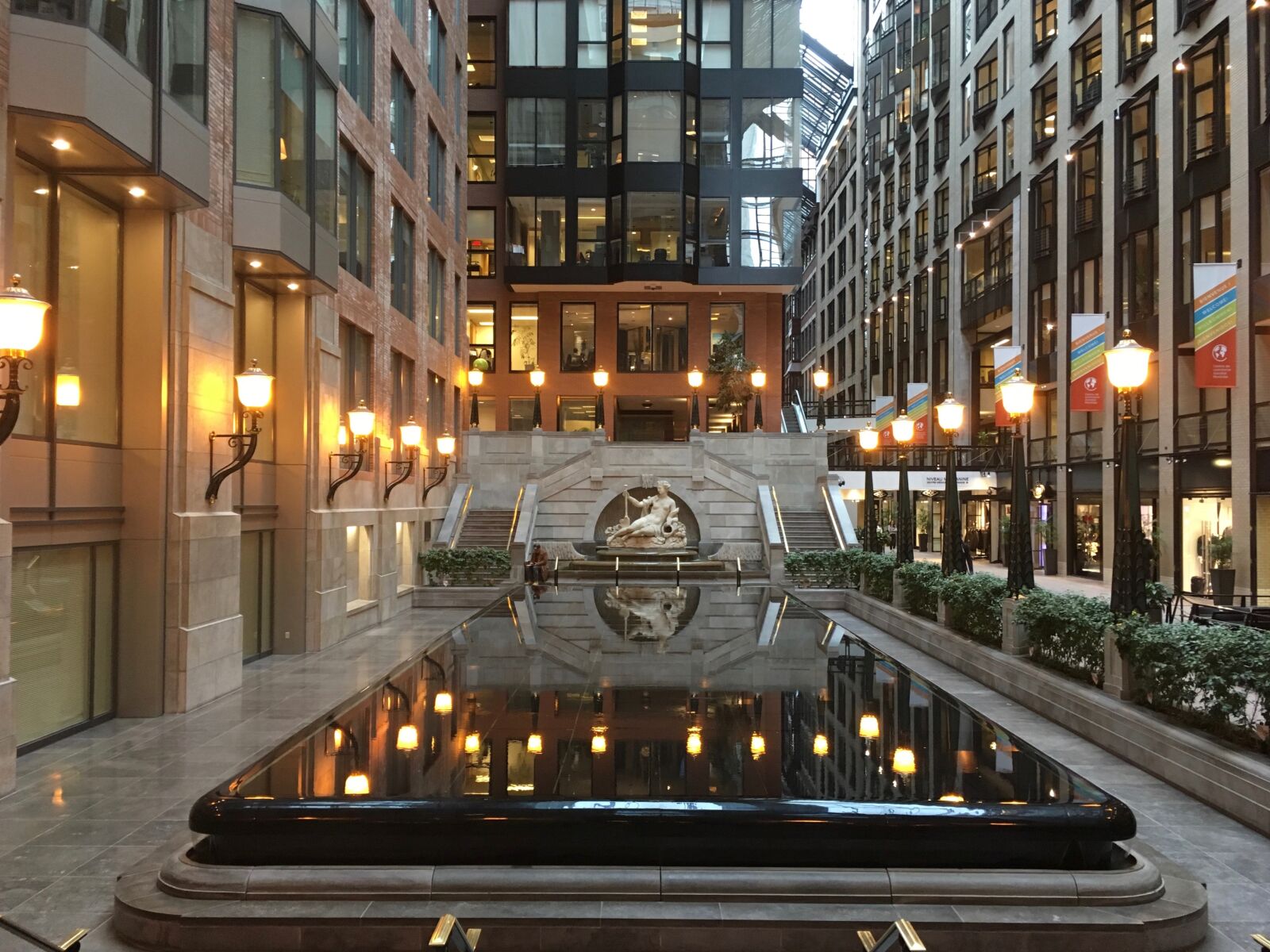 iPhone SE back camera 4.15mm f/2.2 sample photo. Commercial, building, fountain photography