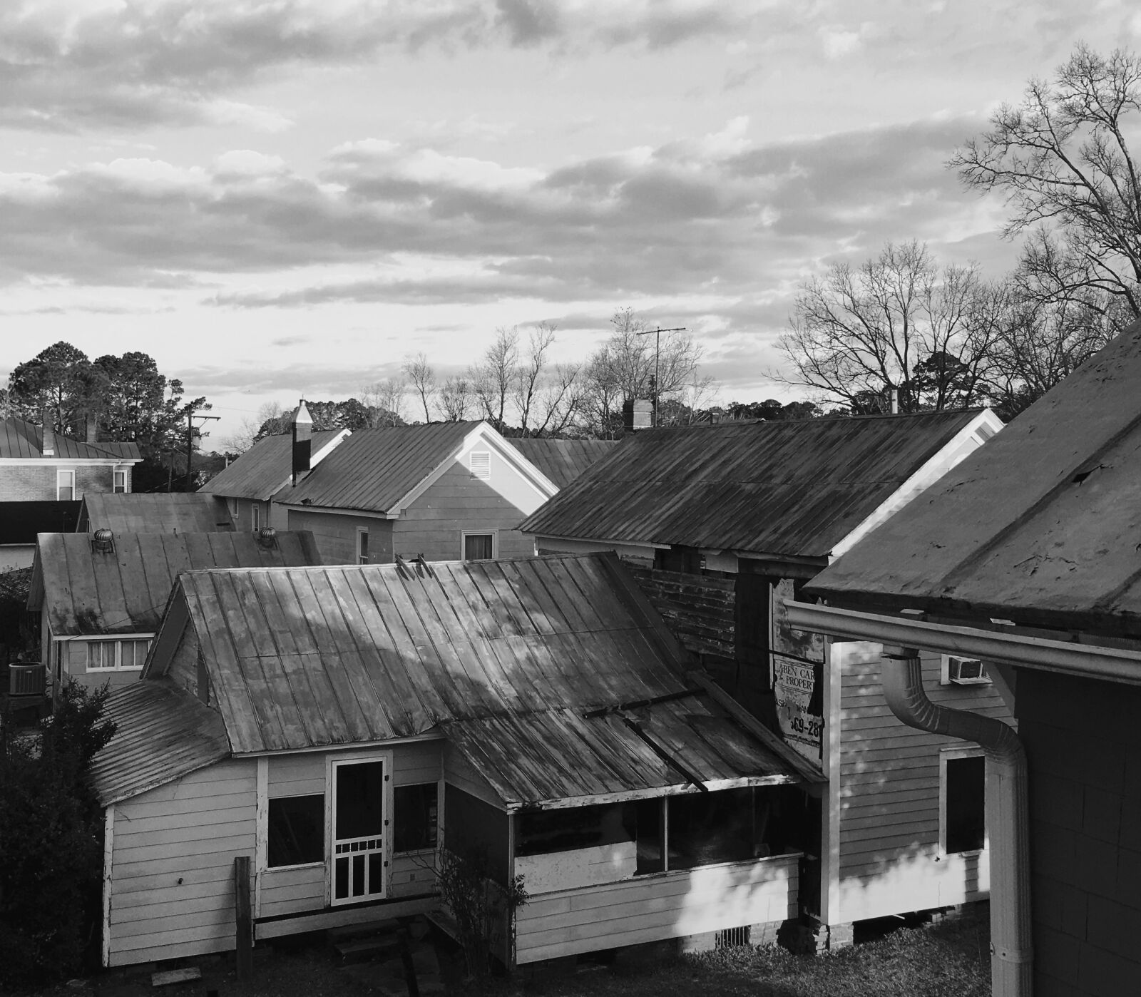Apple iPhone 6s sample photo. Rooflines, black and white photography