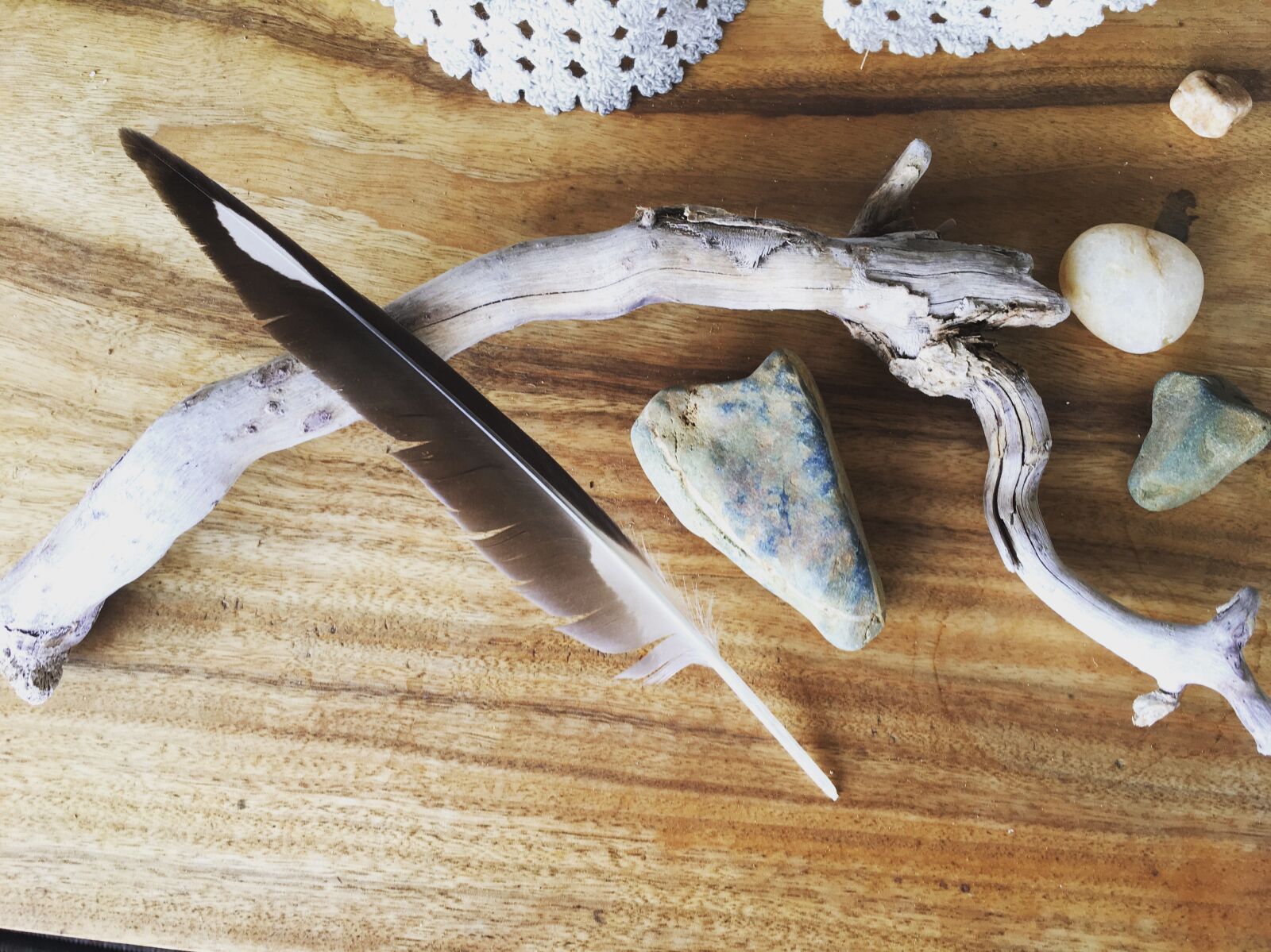 Apple iPhone 6s sample photo. Feather, hearts, nature, rocks photography