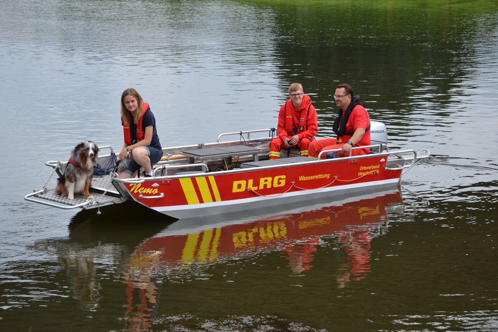 Nikon D3100 sample photo. Dlrg, water, boat photography