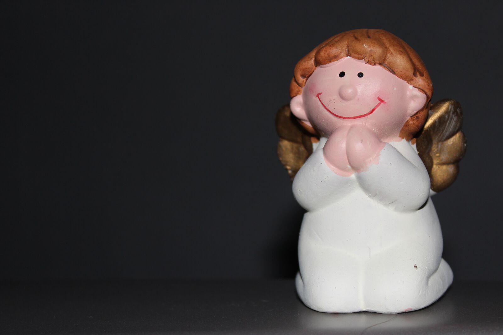 Canon EOS 600D (Rebel EOS T3i / EOS Kiss X5) sample photo. Satisfied angel, smiling angel photography