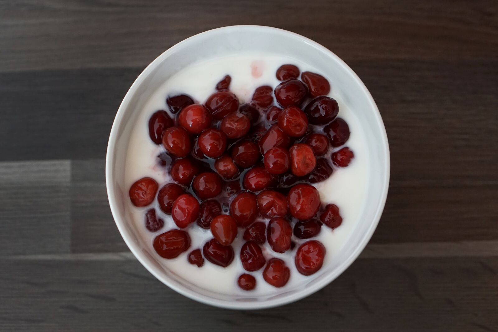 E 50mm F1.8 OSS sample photo. Cranberry, cranberries, yogurt photography