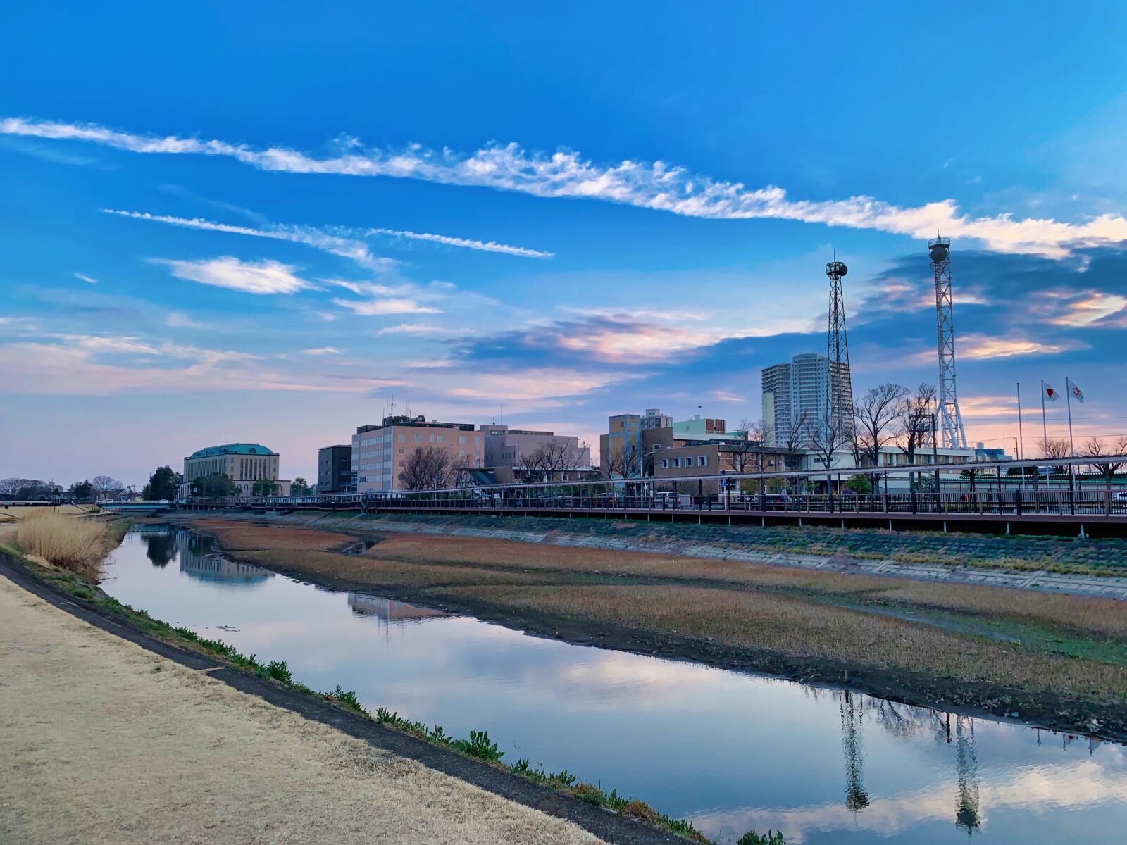 iPhone XS Max back dual camera 4.25mm f/1.8 sample photo. Blue, canal, clouds photography