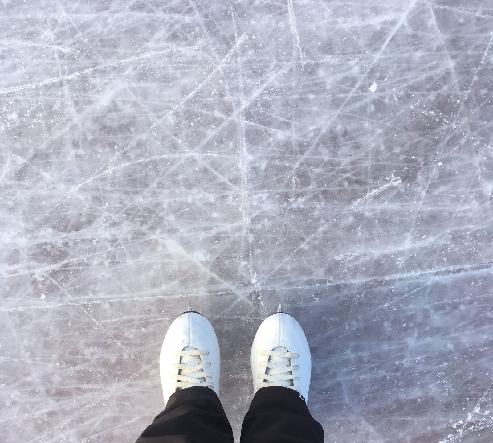 iPhone SE back camera 4.15mm f/2.2 sample photo. Ice, skating, winter photography