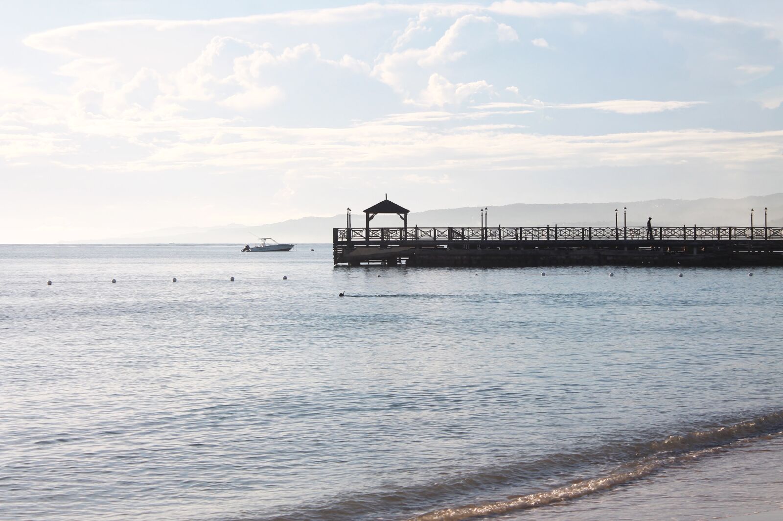 Canon EOS 1100D (EOS Rebel T3 / EOS Kiss X50) sample photo. Pier, water, beach photography