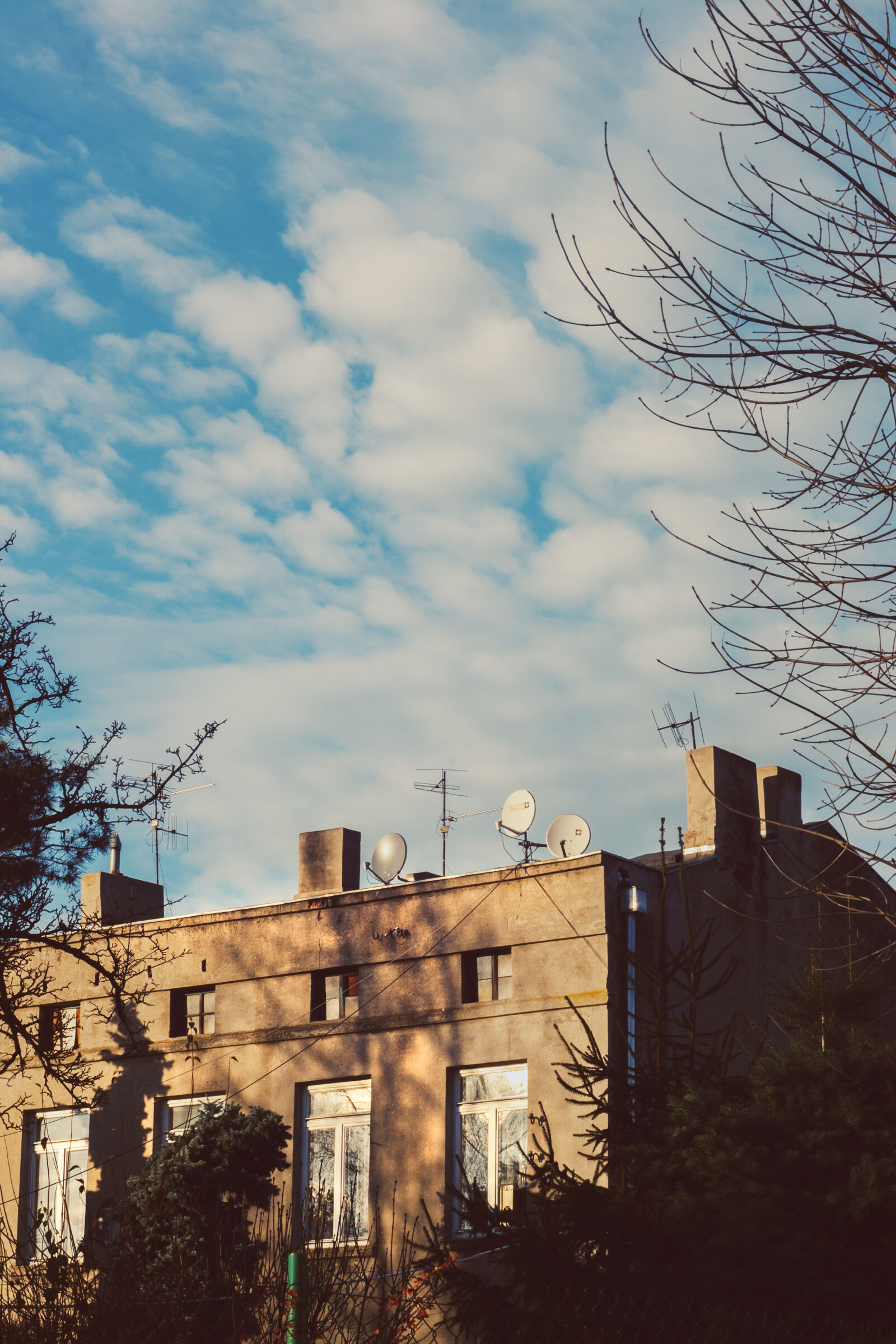 Canon EF 35-80mm f/4-5.6 sample photo. Tenement, house, blue, sky photography