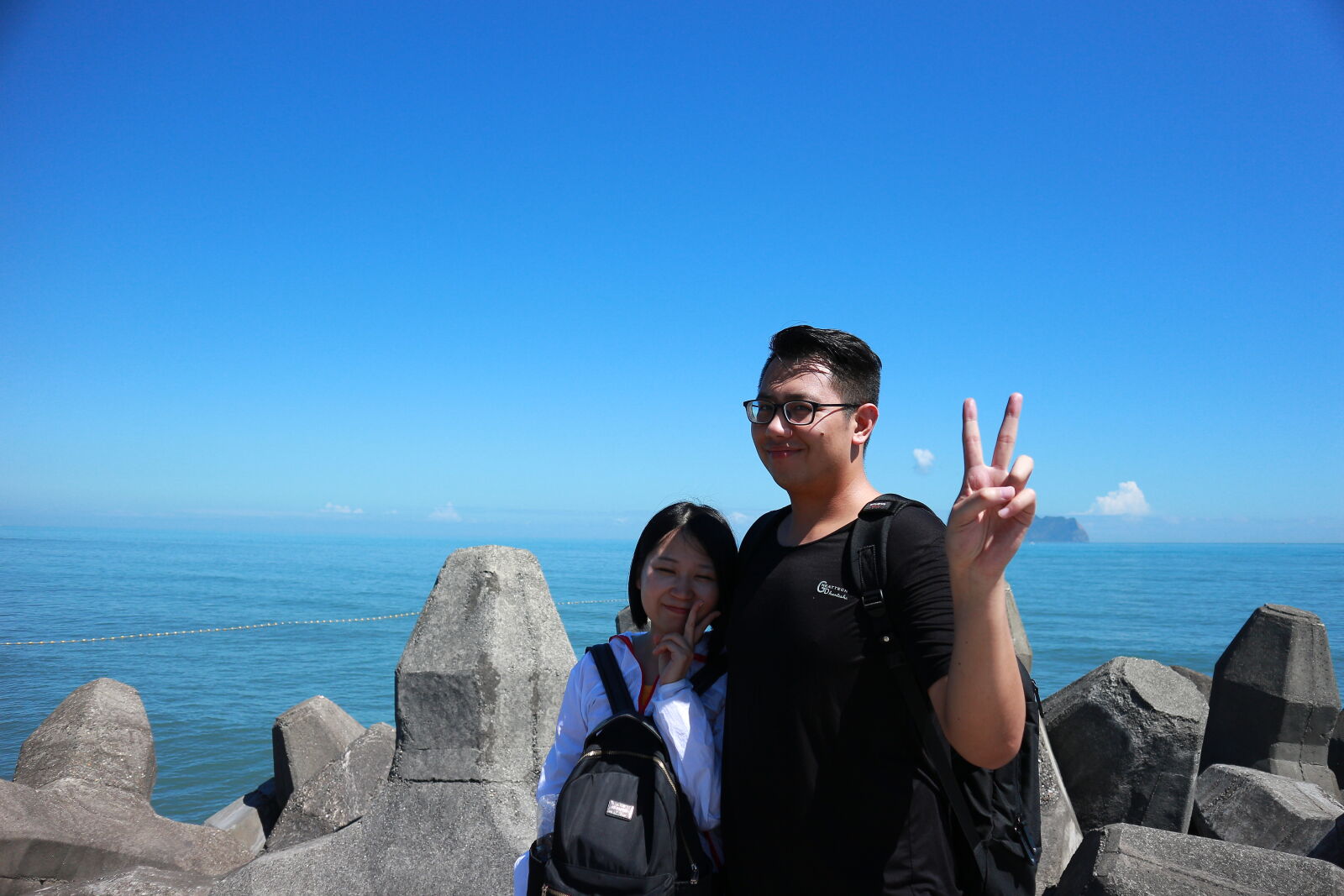 Canon EOS M sample photo. Friends, standing, on, beach photography