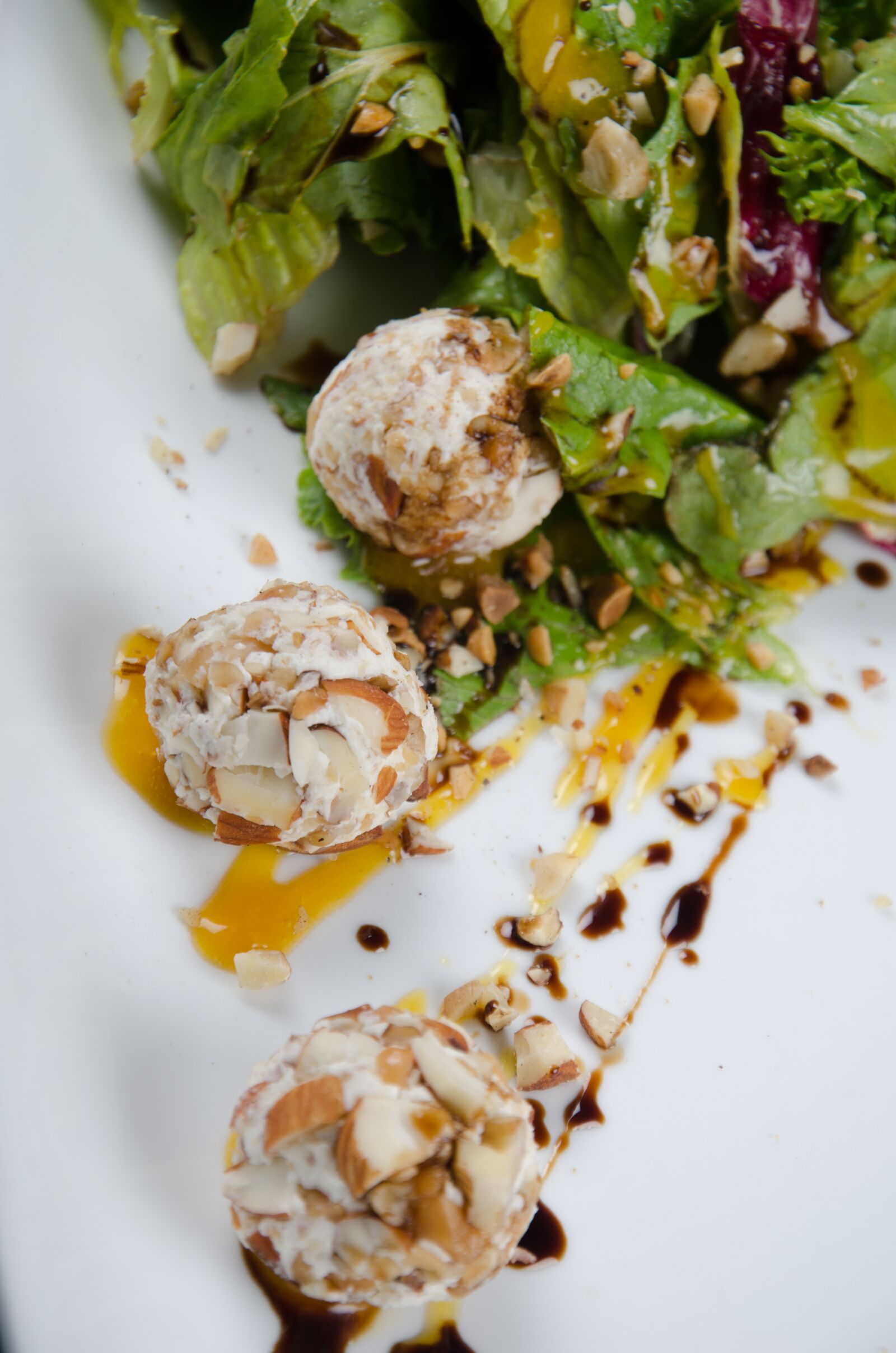 Nikon D7000 sample photo. Salad, sauces, almonds photography
