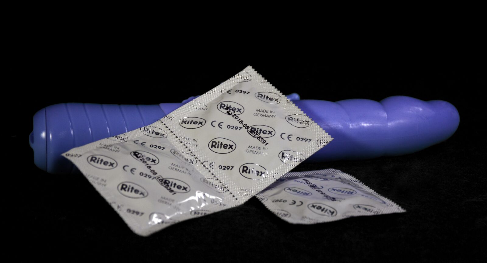 Nikon D5200 sample photo. Dildo, vibrator, condoms photography