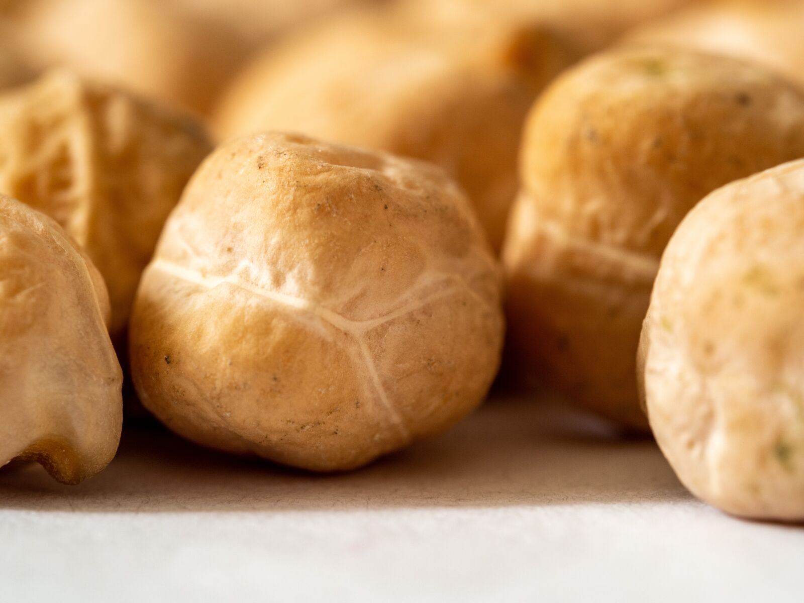 Olympus OM-D E-M10 III sample photo. Chickpeas, legumes, raw materials photography