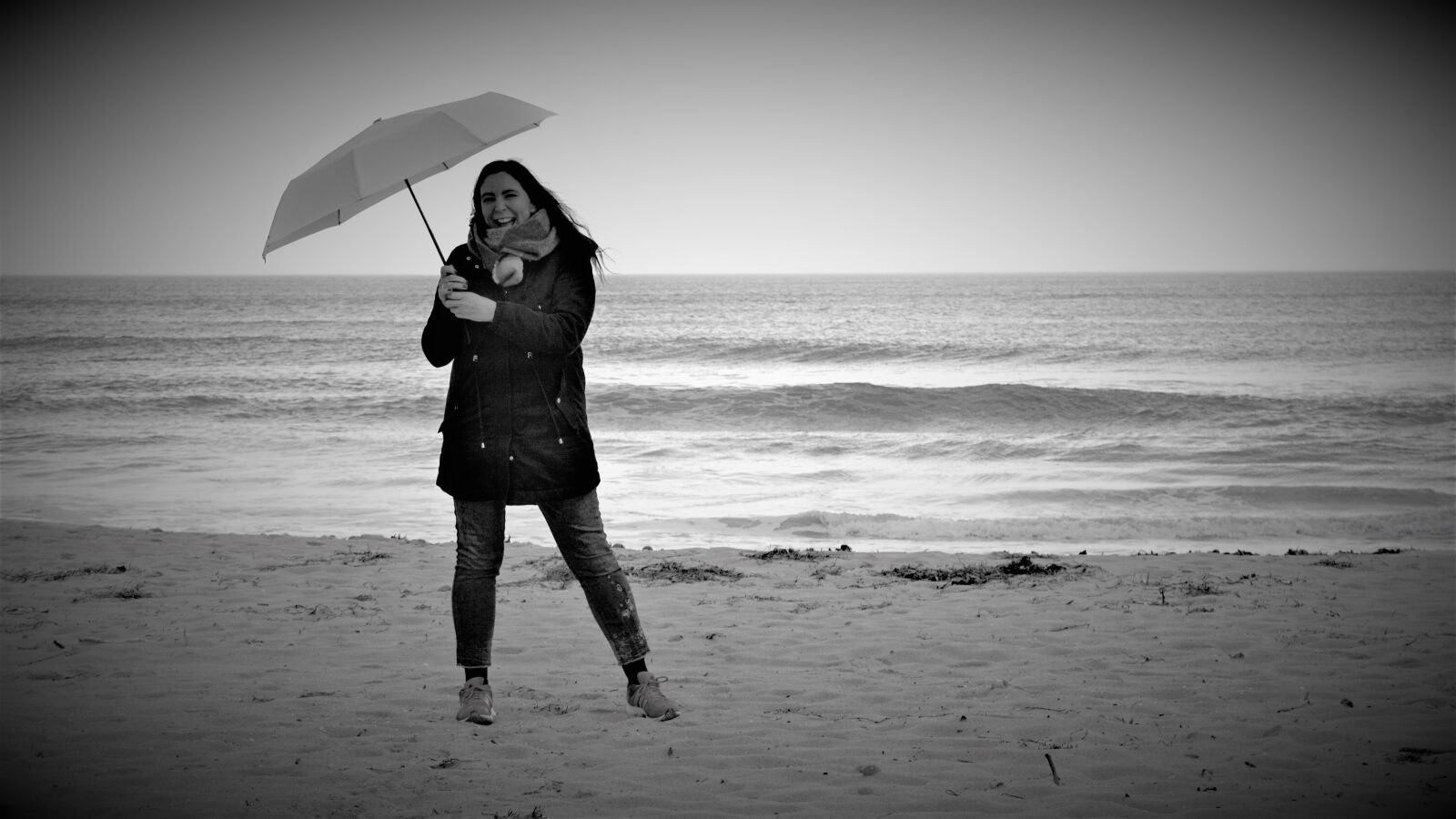 Sony E 18-200mm F3.5-6.3 OSS LE sample photo. Rainy weather, umbrella, woman photography