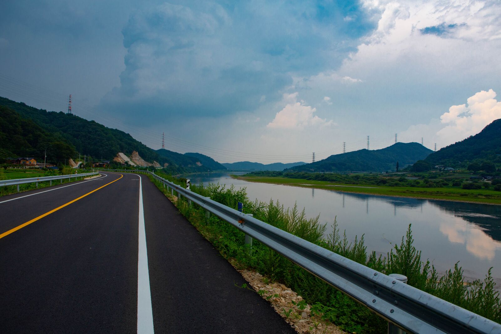 Canon EF 24-70mm F2.8L USM sample photo. Road, sky, river photography
