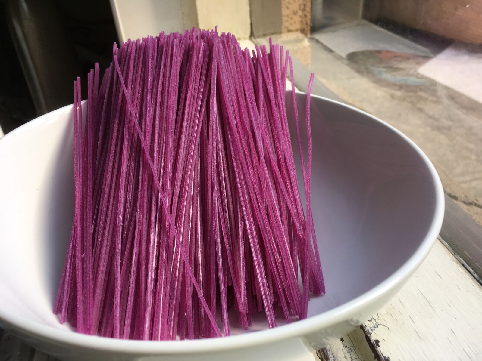 iPhone SE back camera 4.15mm f/2.2 sample photo. Purple pasta, sweet potato photography