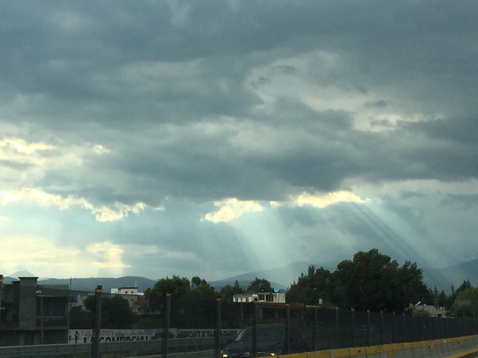 Apple iPhone 6 sample photo. Clouds, sun rays, sky photography