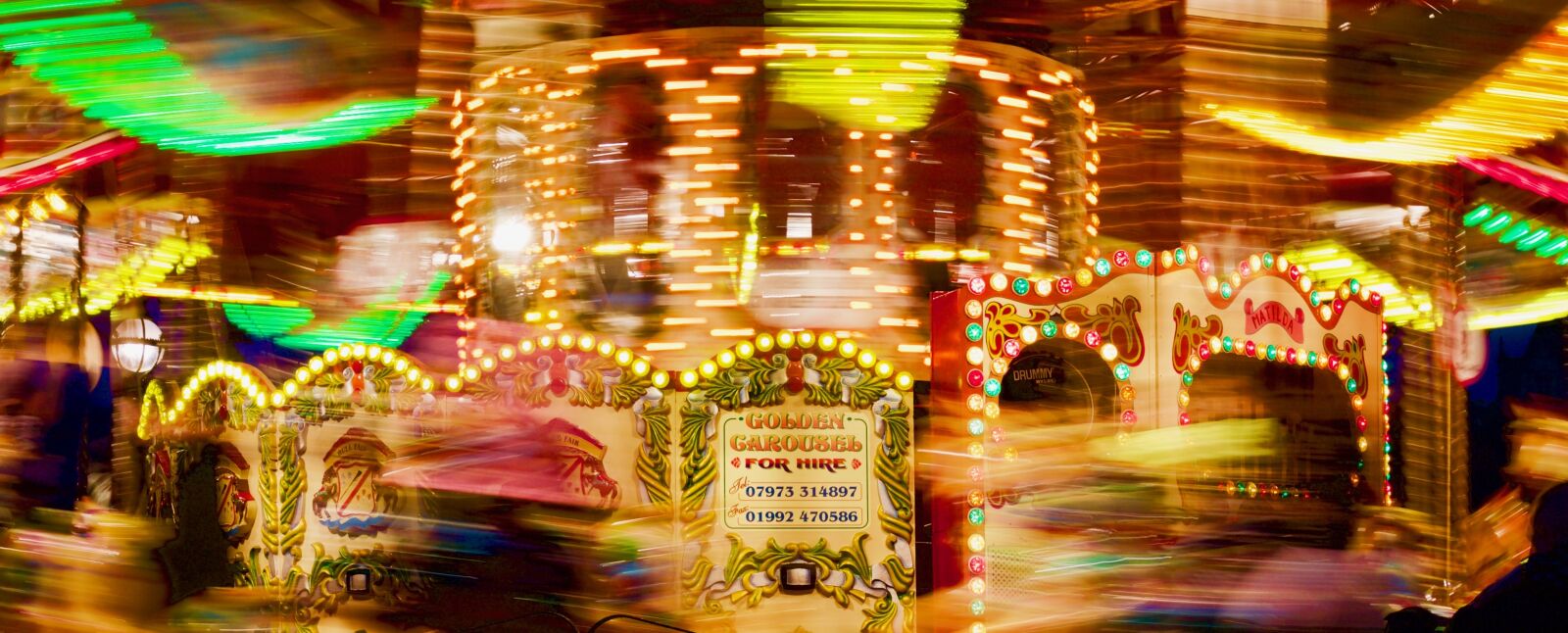 Canon EOS 1100D (EOS Rebel T3 / EOS Kiss X50) + Canon EF 50mm F1.8 STM sample photo. Carousel, ride, fair photography