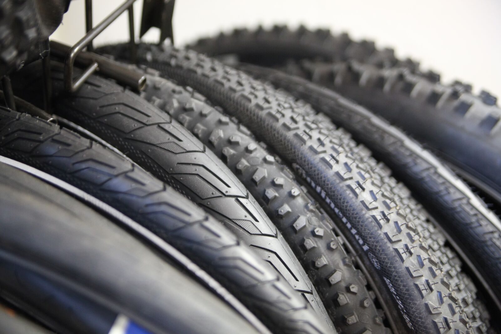 Canon EOS 5D Mark II sample photo. Tyres, bike shop, cycling photography